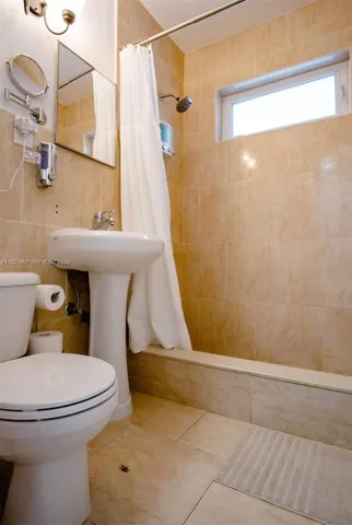 a bathroom with a sink and a toilet
