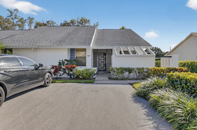 a view of a street with a building in the background