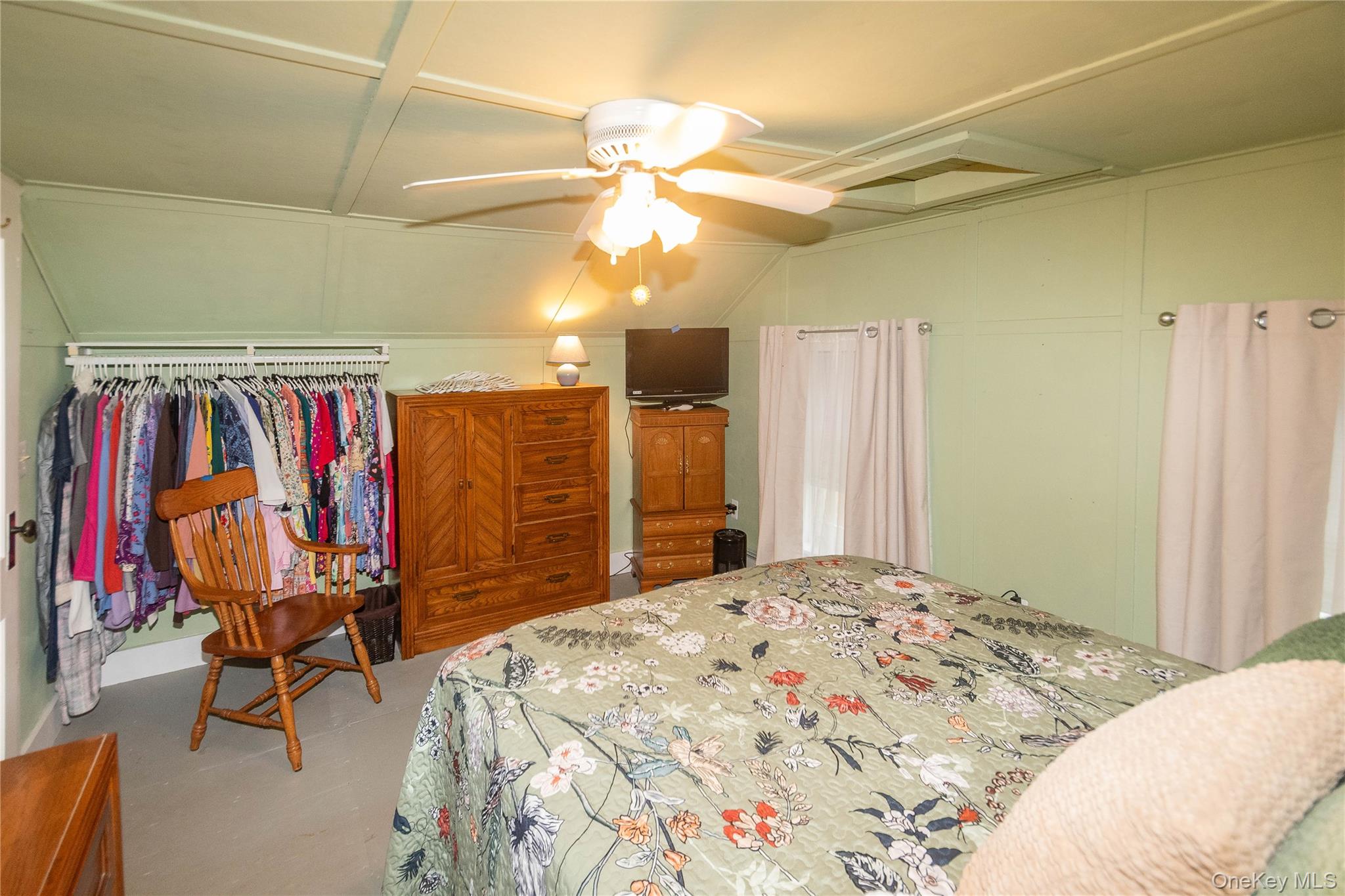 62 Thornton Road Wurtsboro, NY 12790 - Photo 21 of 30 a bedroom with a bed and a closet