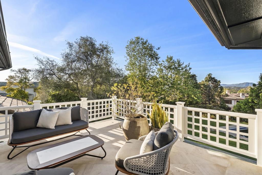7891 Muirfield Way Rancho Santa Fe, CA 92067 - Photo 13 of 26 a view of balcony with couch