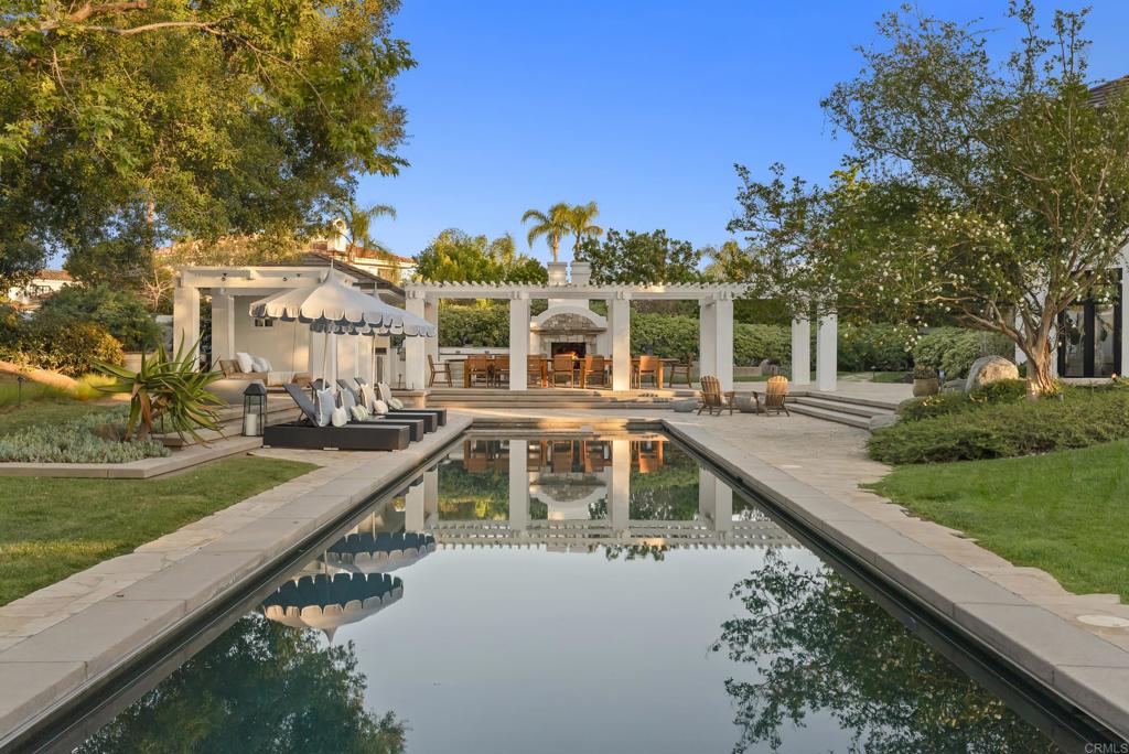7891 Muirfield Way Rancho Santa Fe, CA 92067 - Photo 2 of 26 a view of a house with a yard