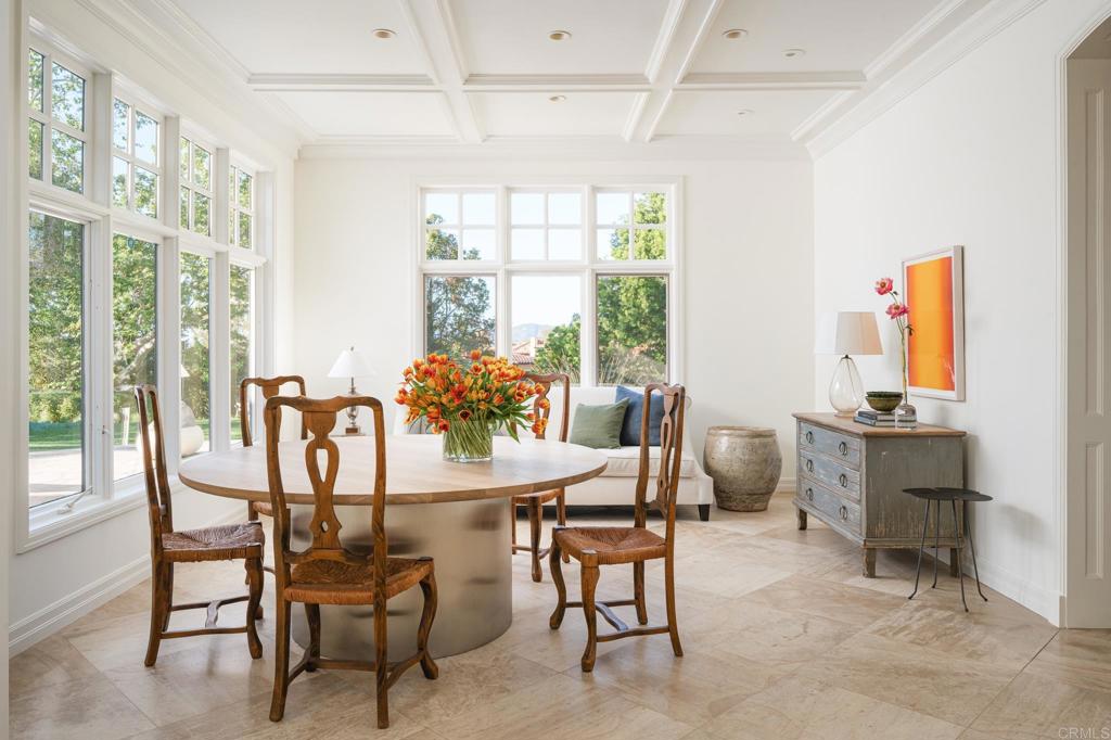 7891 Muirfield Way Rancho Santa Fe, CA 92067 - Photo 5 of 26 a view of a dining room with furniture window and outside view