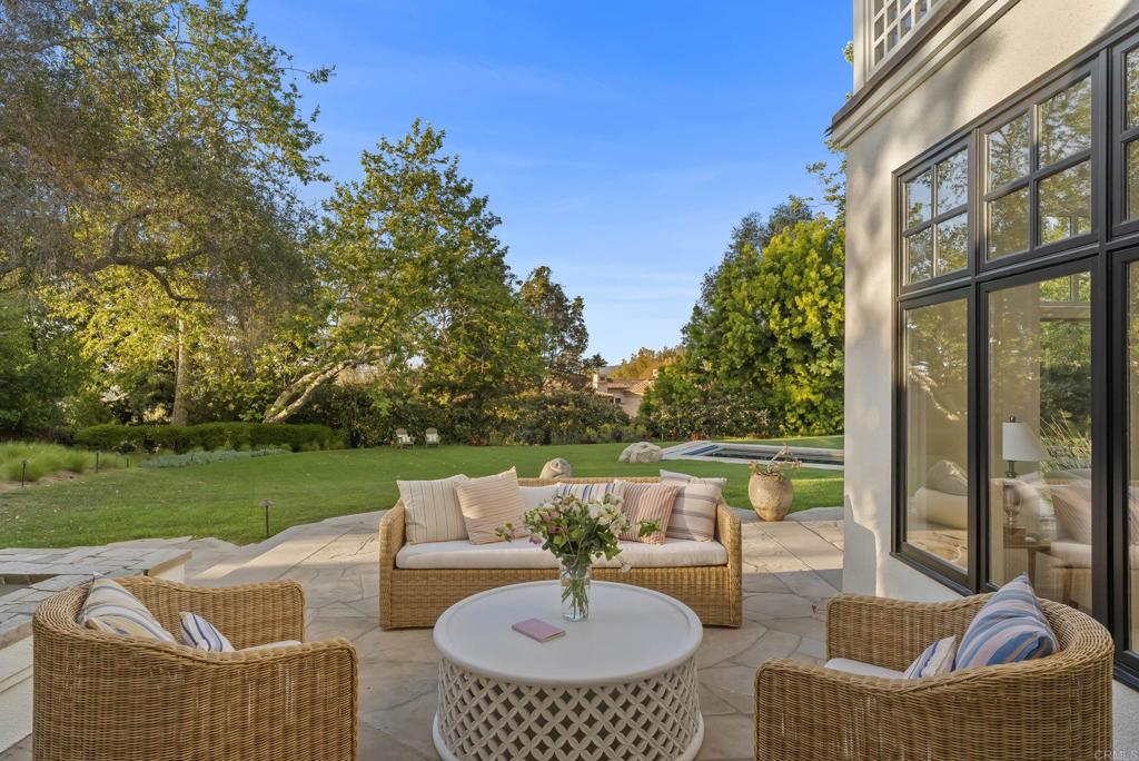 7891 Muirfield Way Rancho Santa Fe, CA 92067 - Photo 8 of 26 a patio with patio area and outdoor seating