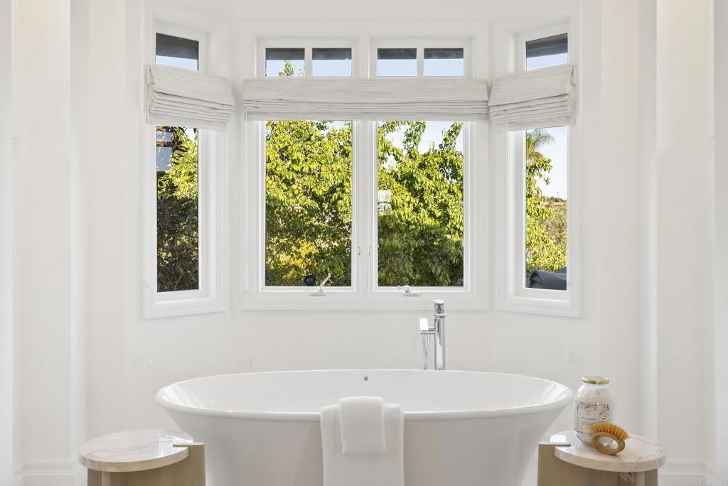 7891 Muirfield Way Rancho Santa Fe, CA 92067 - Photo 10 of 26 a bathroom with a sink and a bathtub