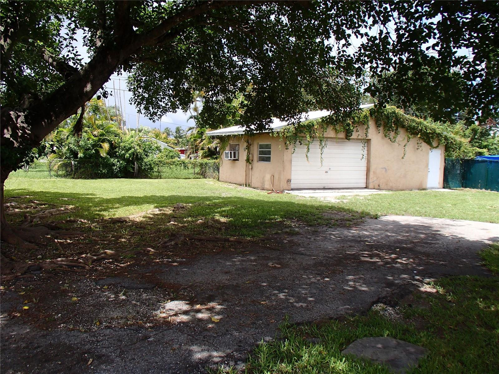 42 Allen Road West Park, FL 33023 - Photo 3 of 29 Large backyard and Garage