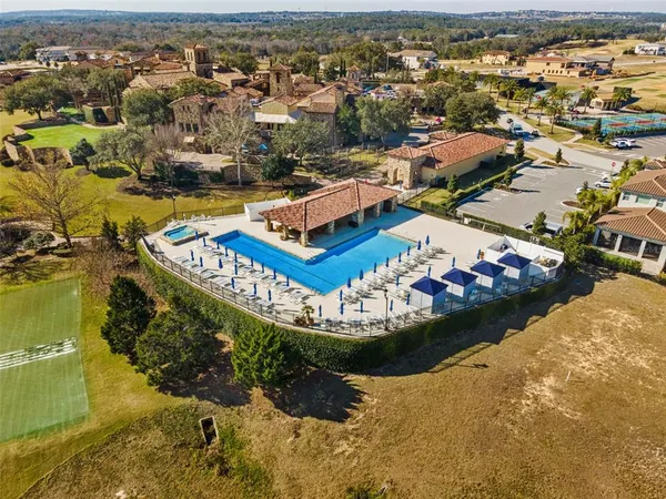 an aerial view of a house with a ocean view
