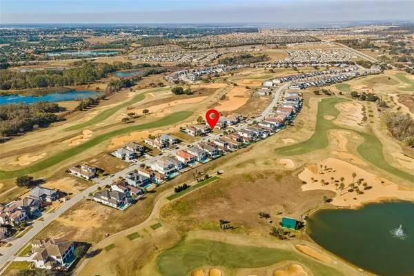 an aerial view of beach and city