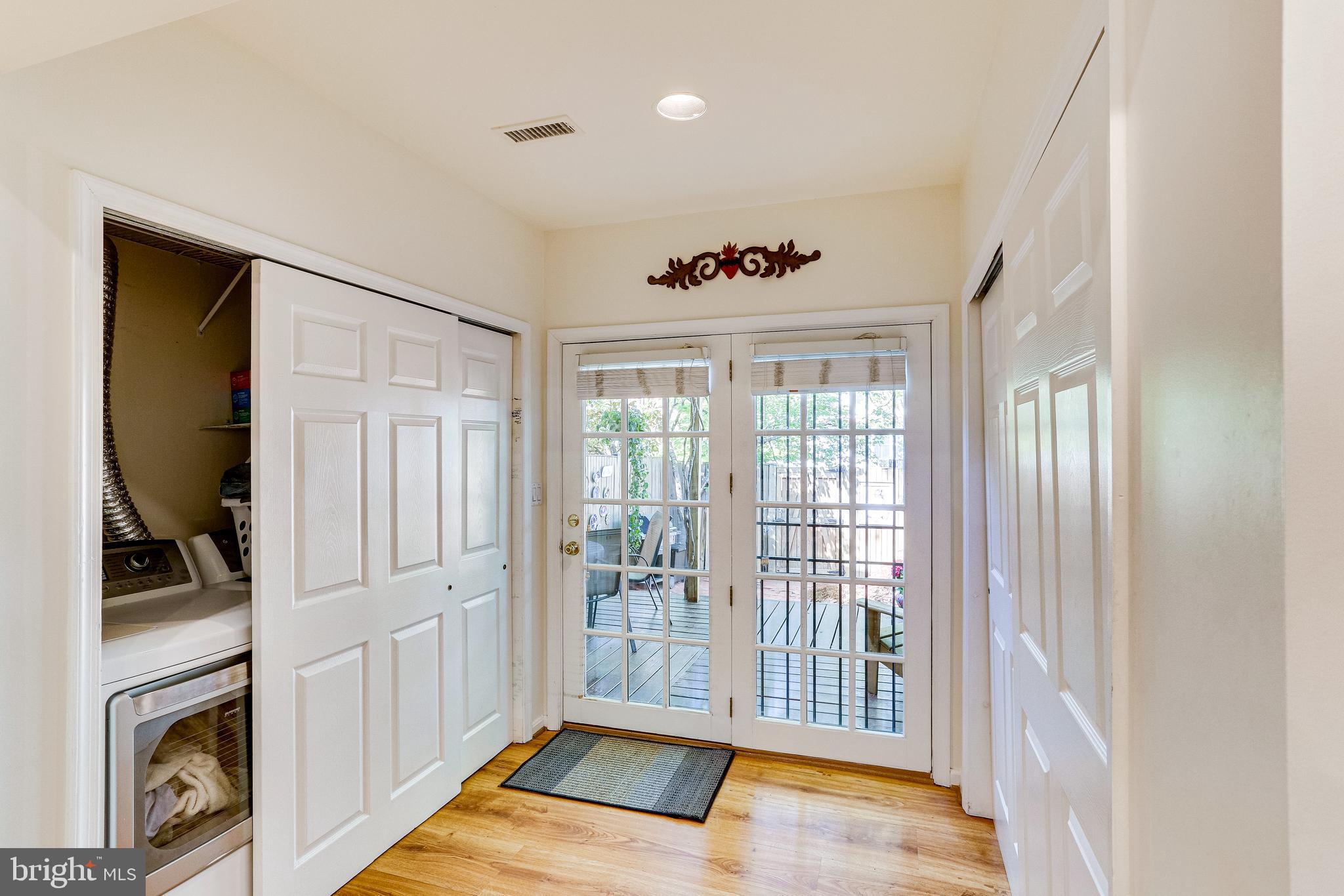 520 8th Street Northeast Washington, DC 20002 - Photo 16 of 61 Full-size W/D in large closet. Patio beyond doors