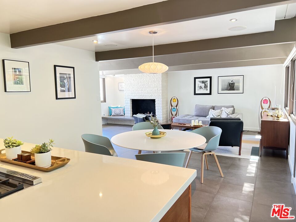 2430 Bywood Drive Glendale, CA 91206 - Photo 7 of 39 a view of a dining room with furniture and wooden floor