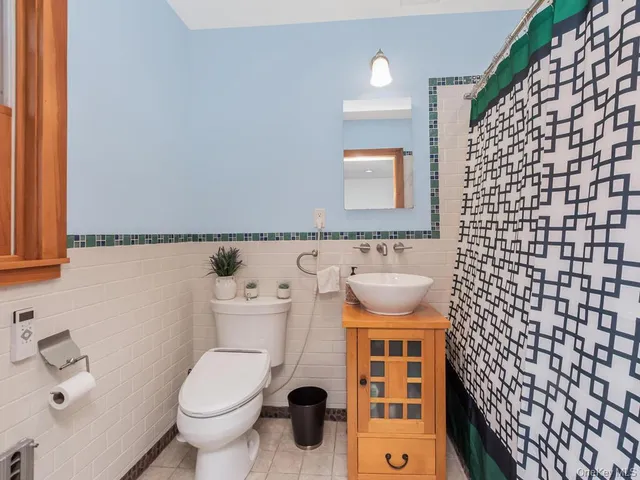 a bathroom with a sink and a toilet