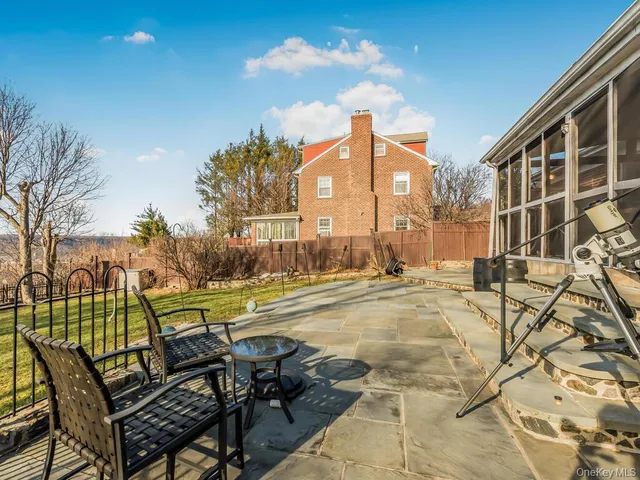 a view of a swimming pool with a lounge chairs