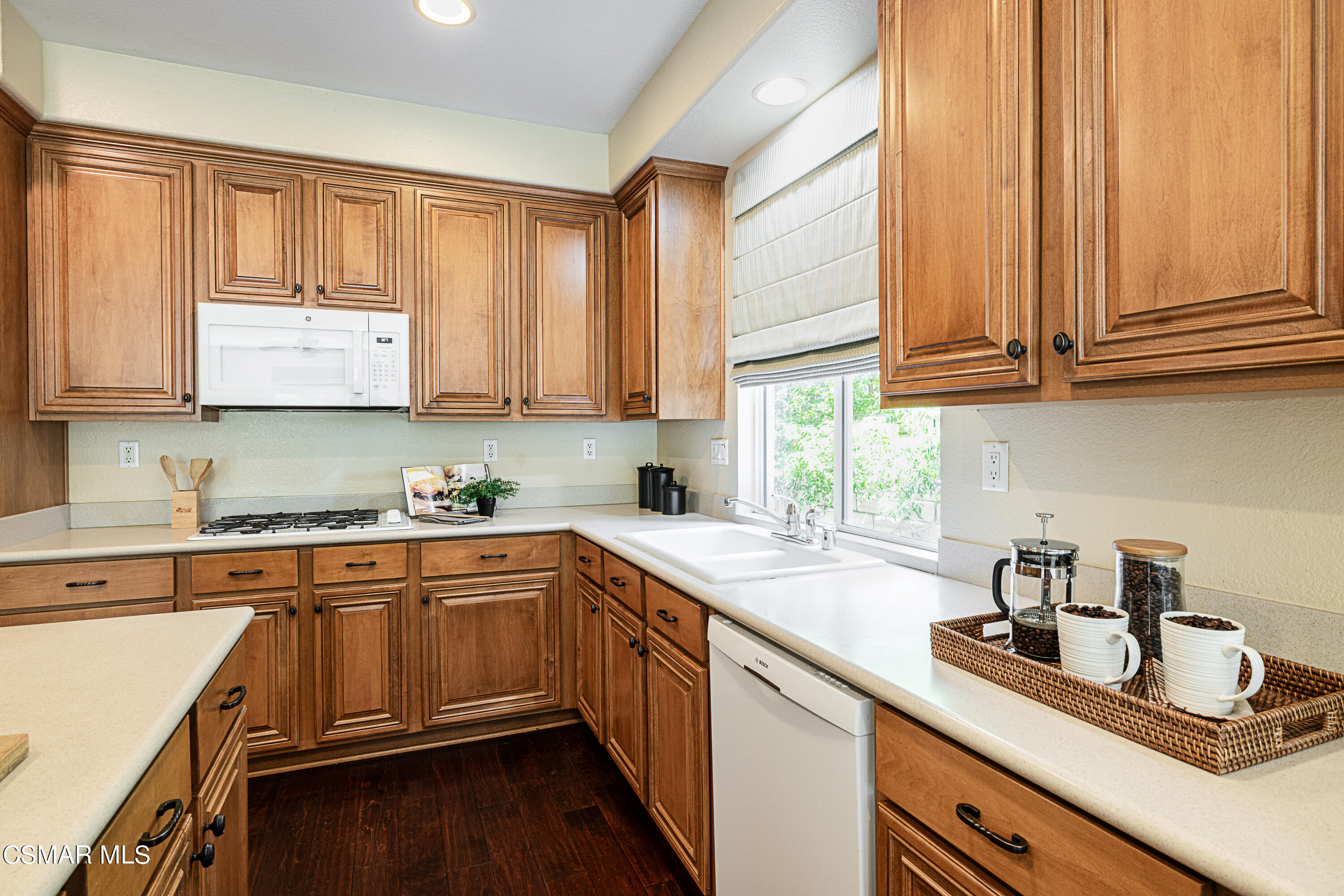 931 North Wood Ranch Parkway Simi Valley, CA 93065 - Photo 14 of 33 a kitchen with stainless steel appliances granite countertop a sink and cabinets