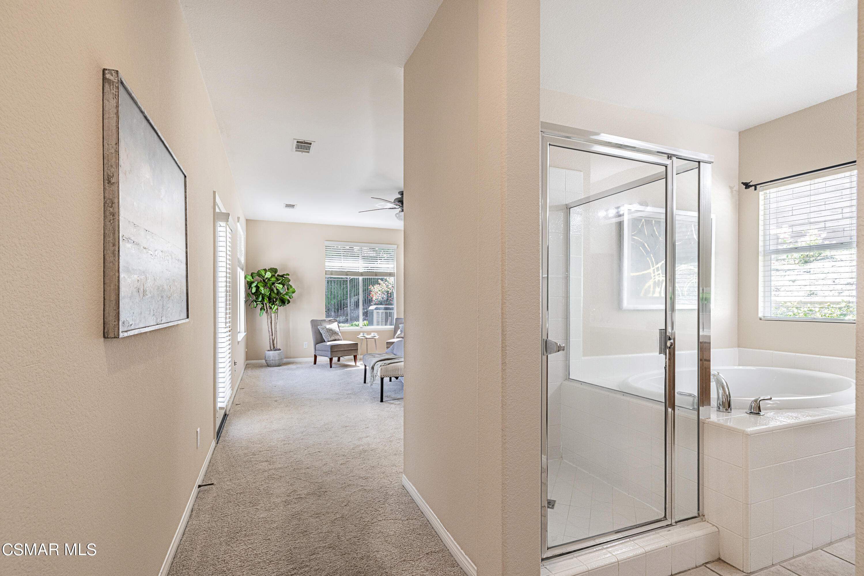931 North Wood Ranch Parkway Simi Valley, CA 93065 - Photo 18 of 33 a view of a hallway with dining area and glass door