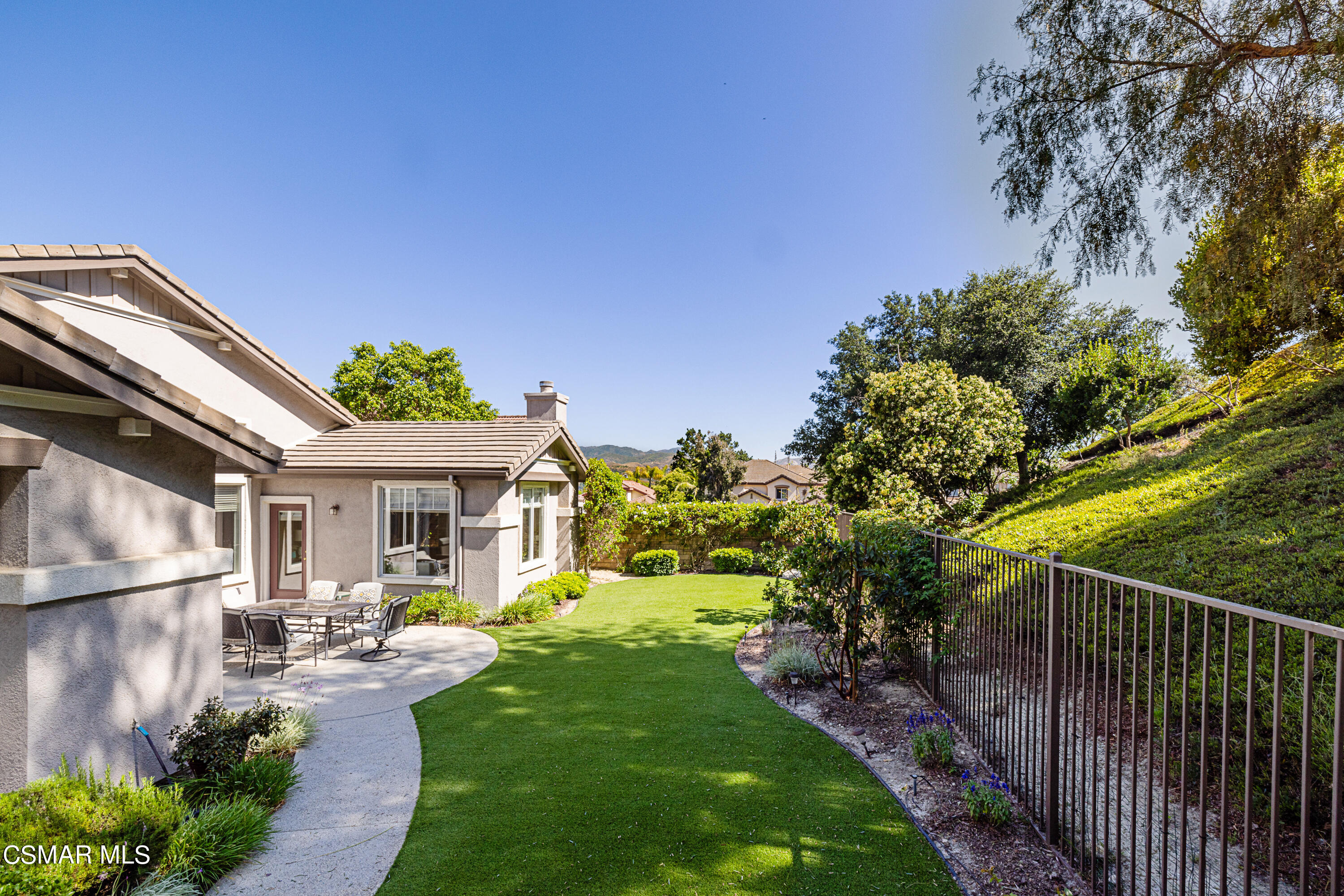 931 North Wood Ranch Parkway Simi Valley, CA 93065 - Photo 33 of 33 a front view of a house with garden