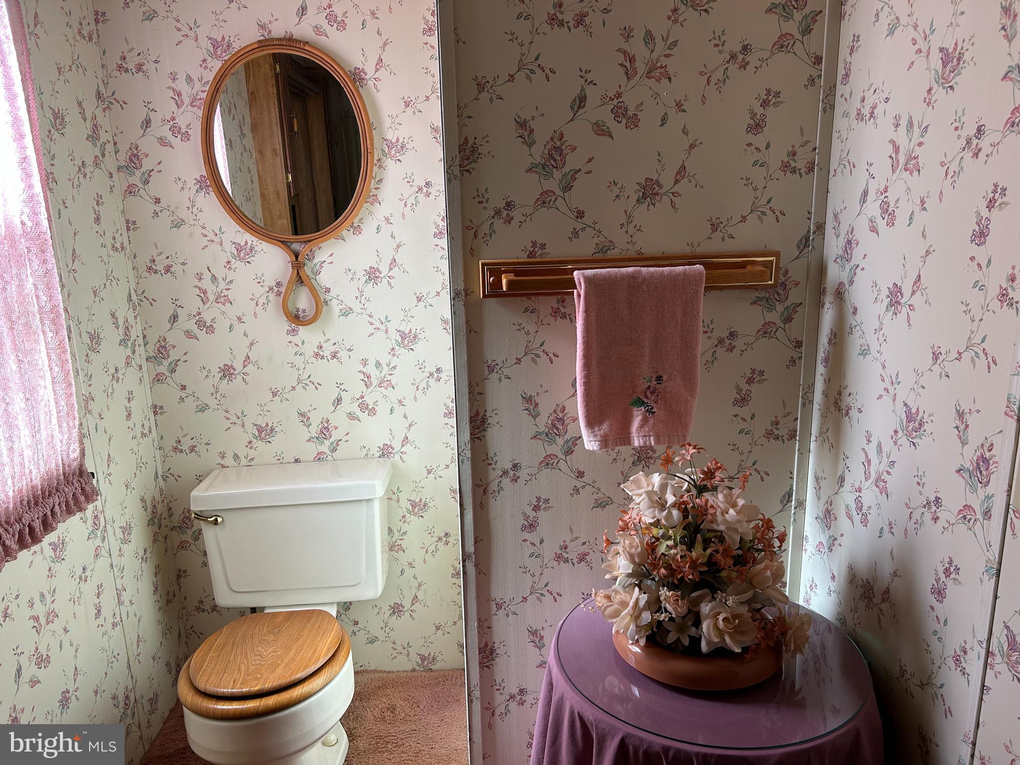 34 Winterset Road, Unit 11 Wilmington, DE 19810 - Photo 18 of 26 a bathroom with a toilet and a sink