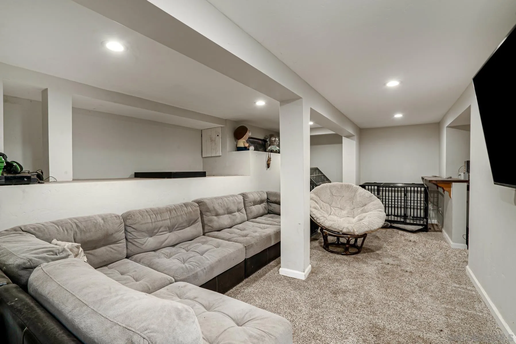 8531 Gardena Road Lakeside, CA 92040 - Photo 16 of 29 a living room with furniture and a flat screen tv