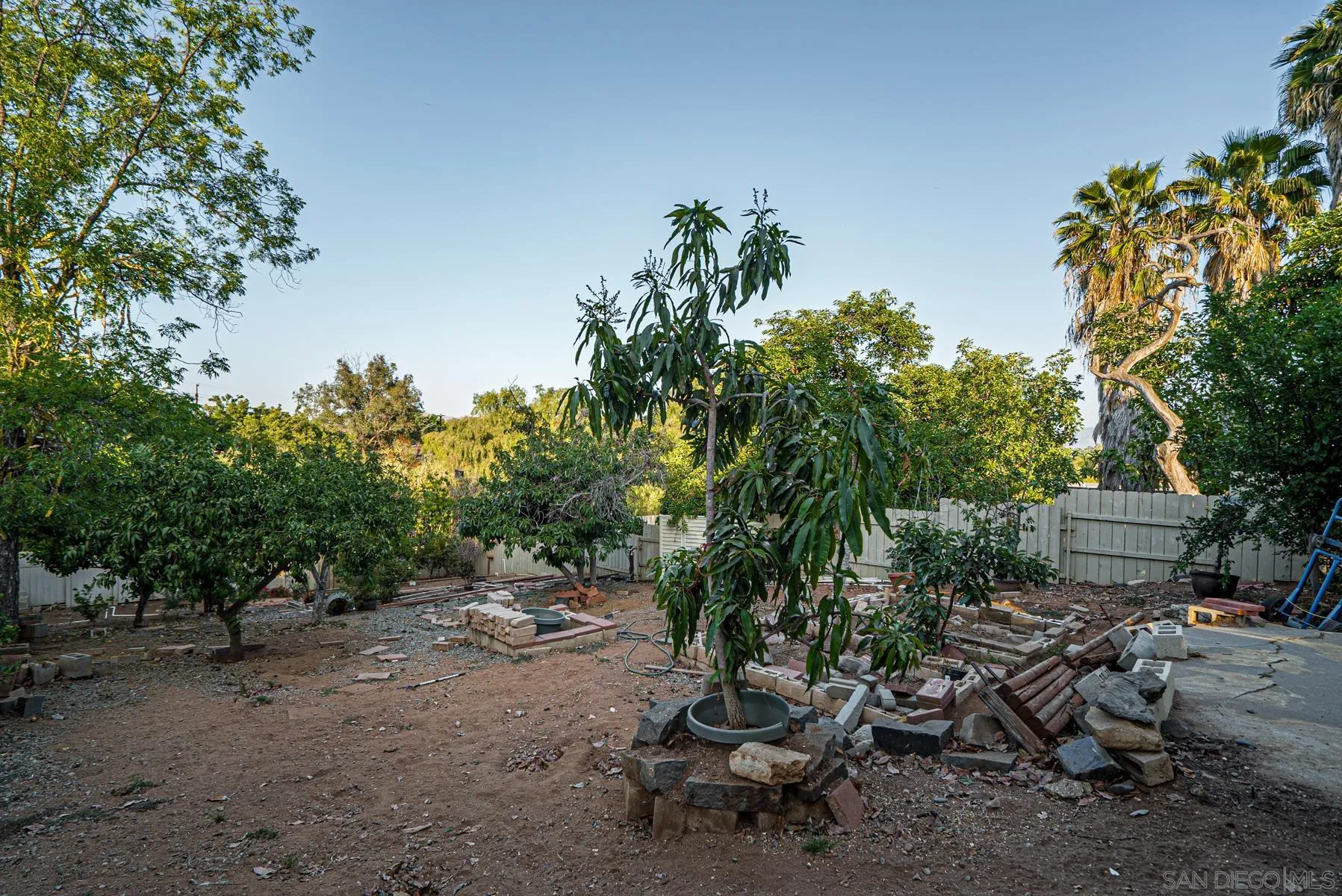 8531 Gardena Road Lakeside, CA 92040 - Photo 23 of 29 a backyard of a house with table and chairs