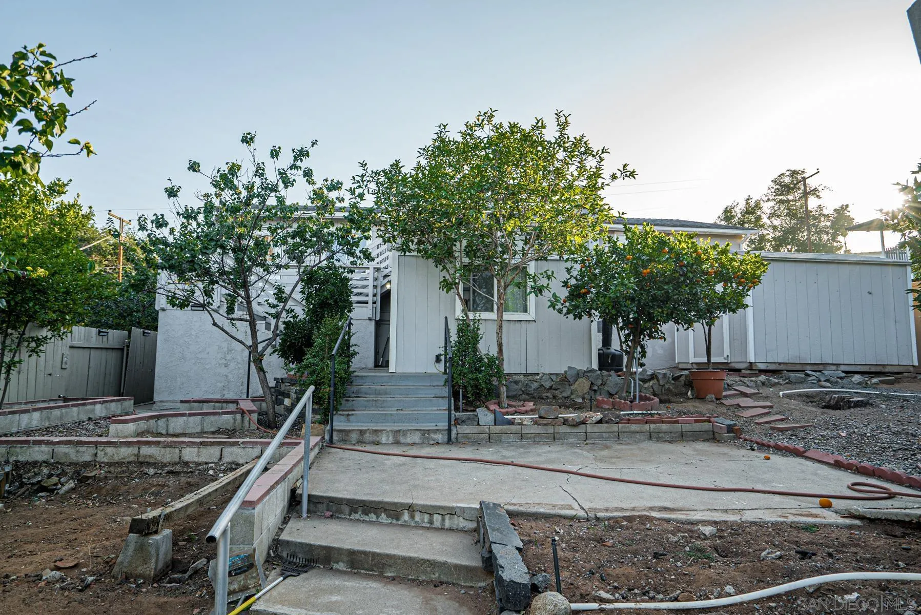 8531 Gardena Road Lakeside, CA 92040 - Photo 24 of 29 a front view of a house with trees