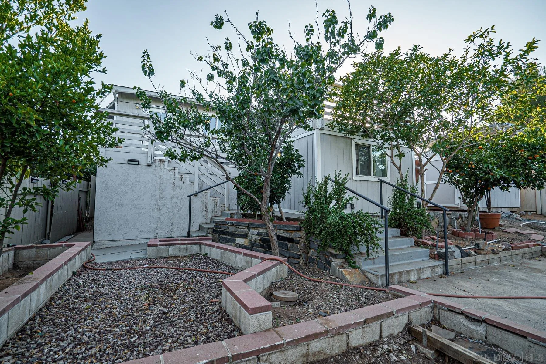 8531 Gardena Road Lakeside, CA 92040 - Photo 25 of 29 a backyard of a house with lots of green space