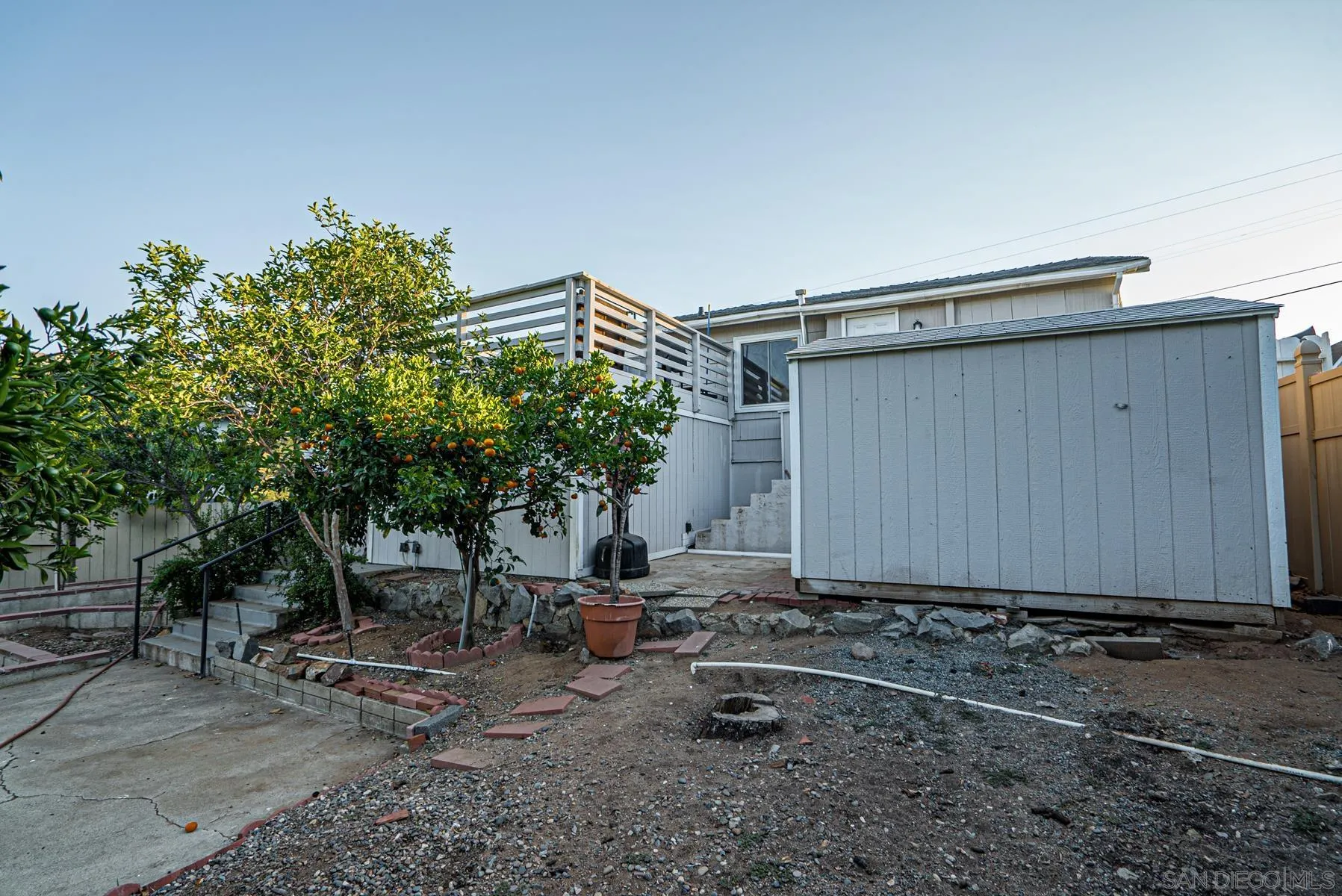 8531 Gardena Road Lakeside, CA 92040 - Photo 26 of 29 a backyard of a house with table and chairs