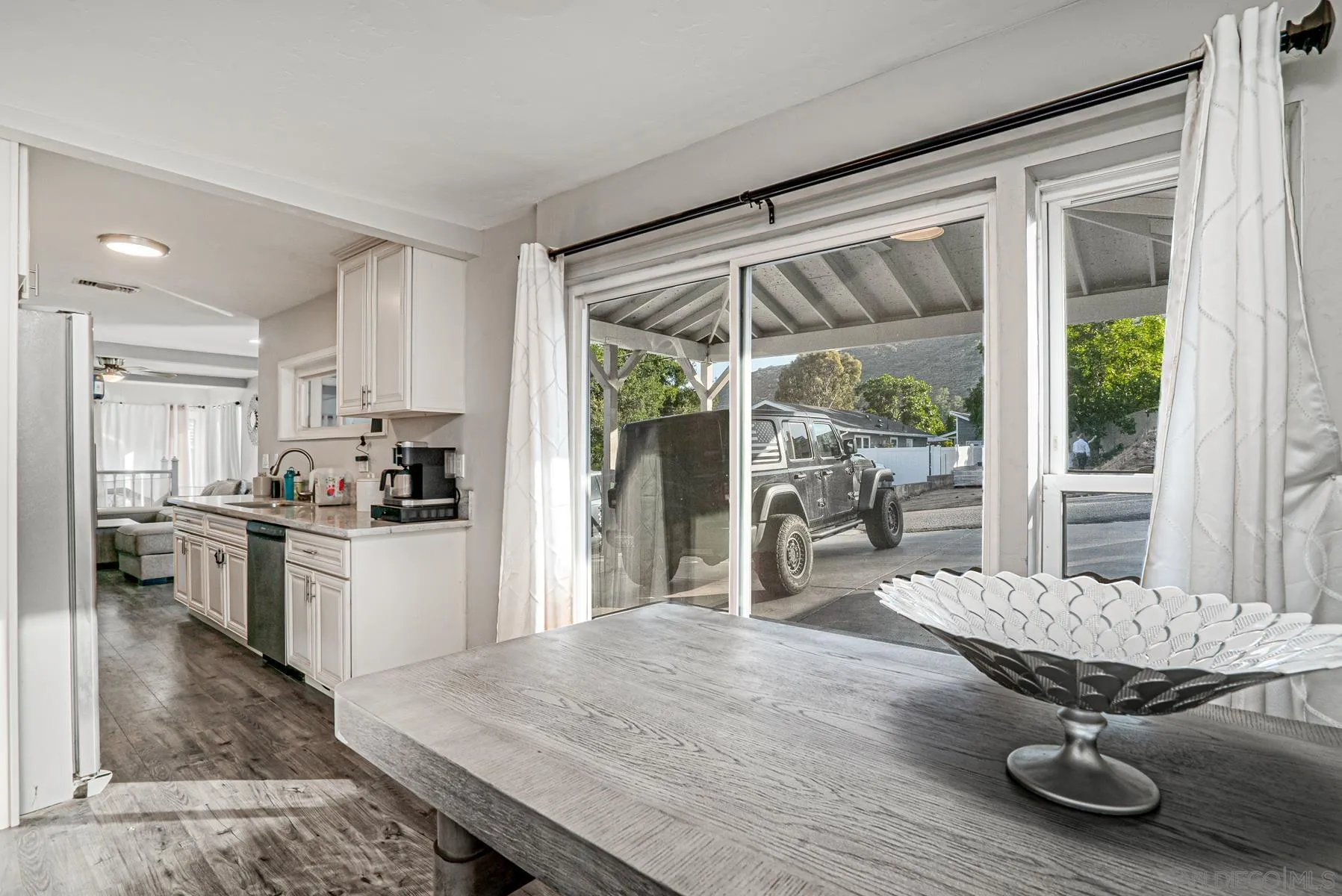 8531 Gardena Road Lakeside, CA 92040 - Photo 8 of 29 a kitchen with sink and refrigerator