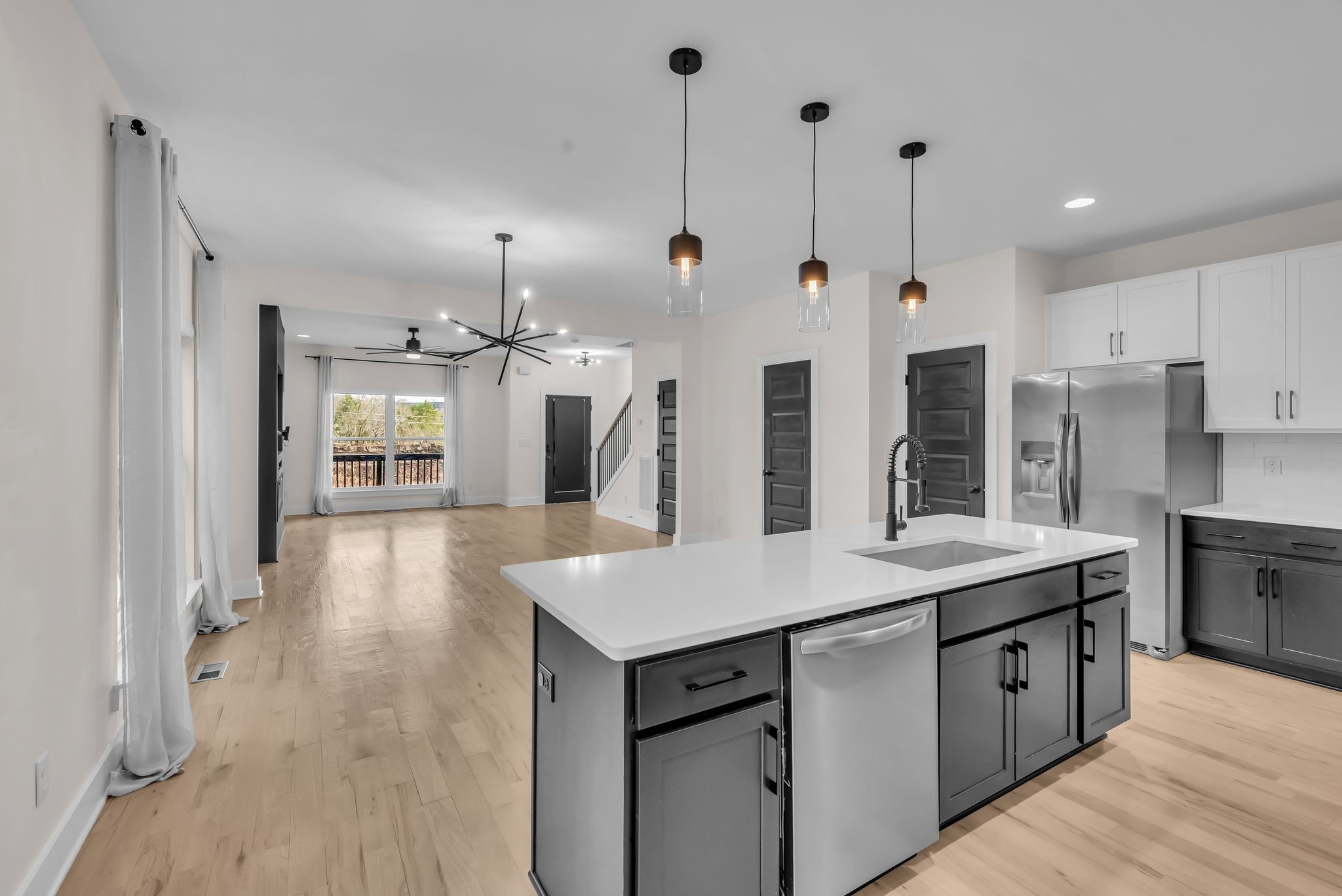 425 Toney Road, Unit B Nashville, TN 37207 - Photo 6 of 14 a kitchen with a sink center island and stainless steel appliances