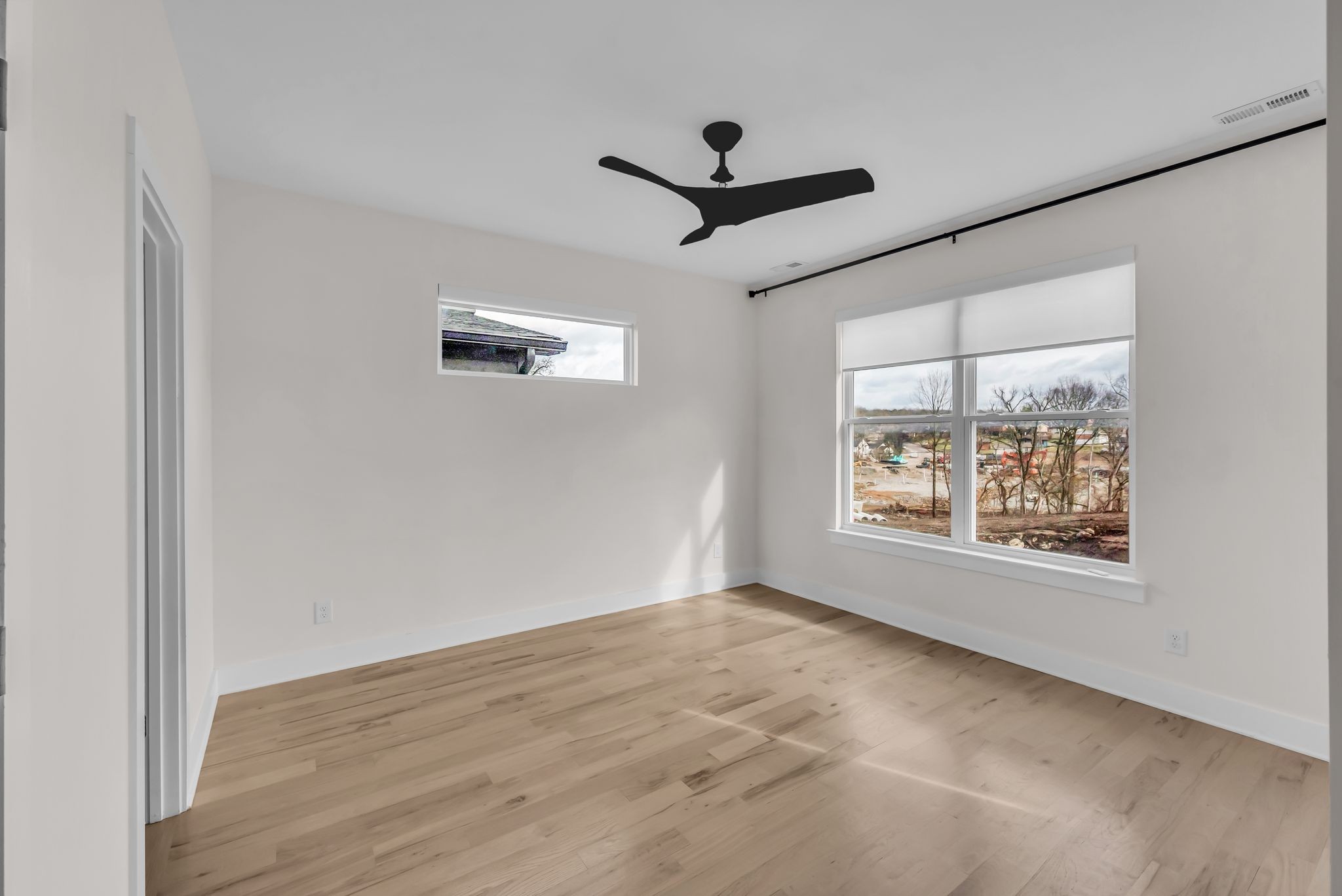 425 Toney Road, Unit B Nashville, TN 37207 - Photo 7 of 14 a view of an empty room with a window