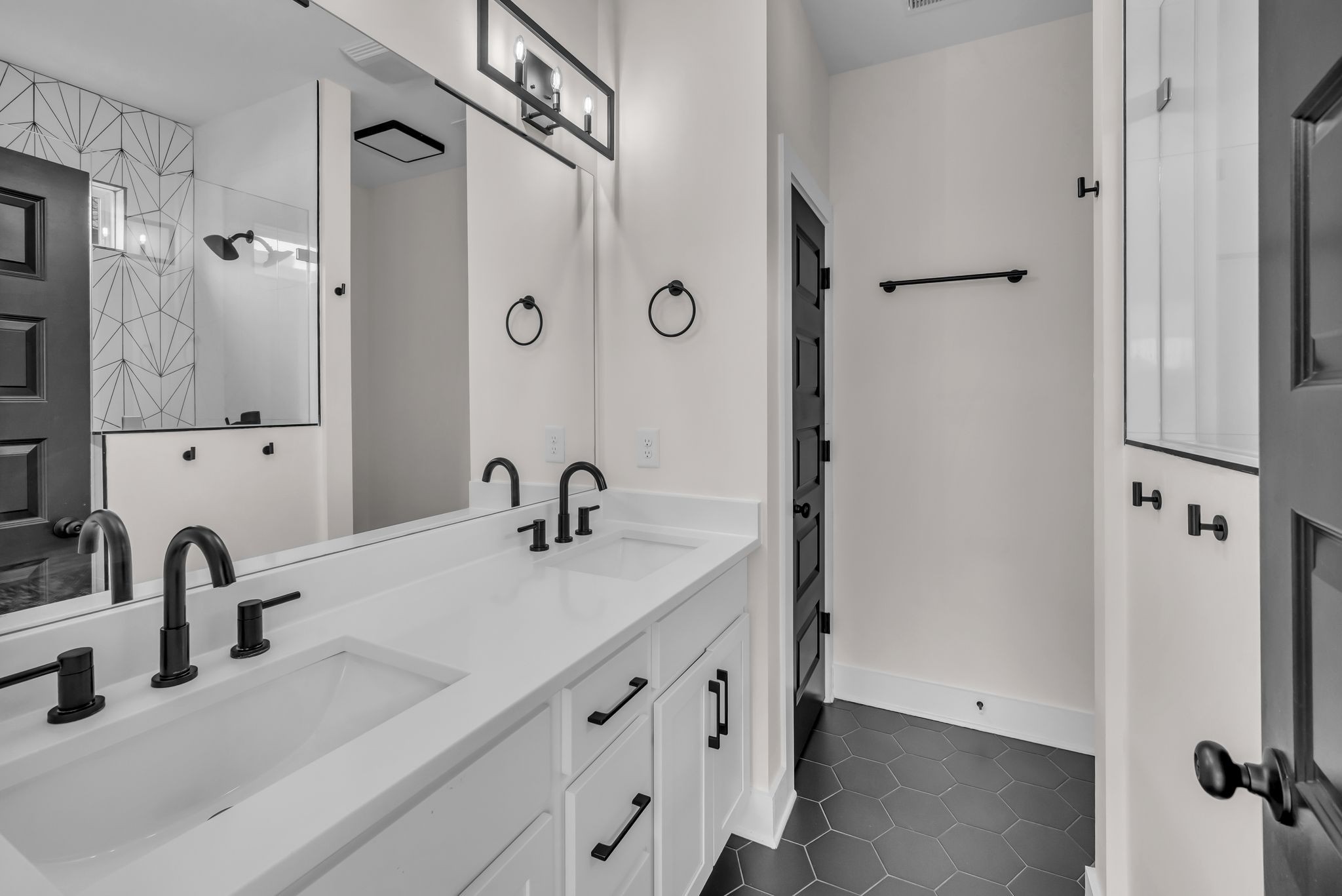 425 Toney Road, Unit B Nashville, TN 37207 - Photo 8 of 14 a bathroom with a sink and a mirror