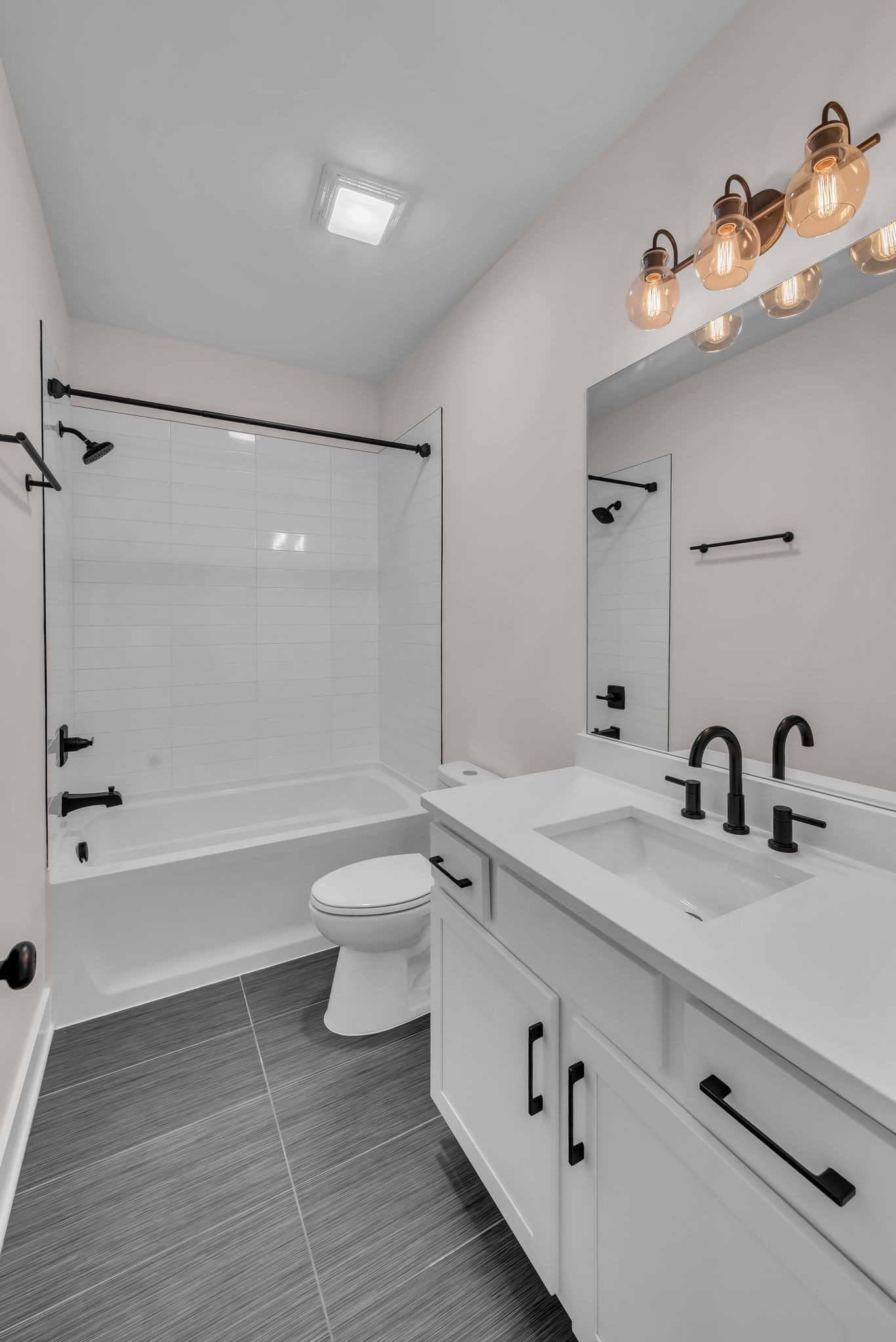 425 Toney Road, Unit B Nashville, TN 37207 - Photo 10 of 14 a bathroom with a sink a toilet and a bathtub