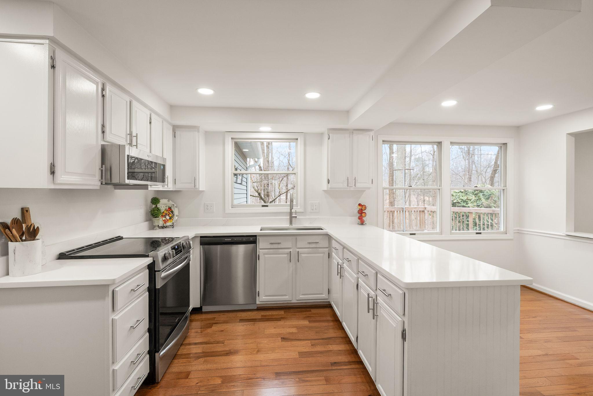 8461 Rushing Creek Court Springfield, VA 22153 - Photo 20 of 96 kitchen with new appliances & quartz