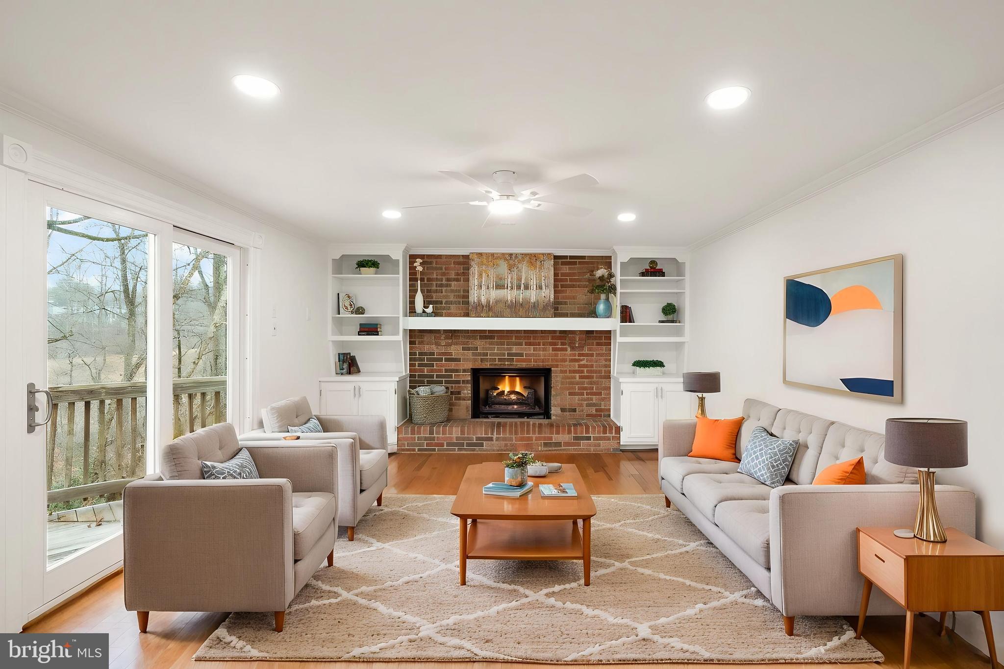 8461 Rushing Creek Court Springfield, VA 22153 - Photo 28 of 96 family room w/ built-ins -wood burning FP