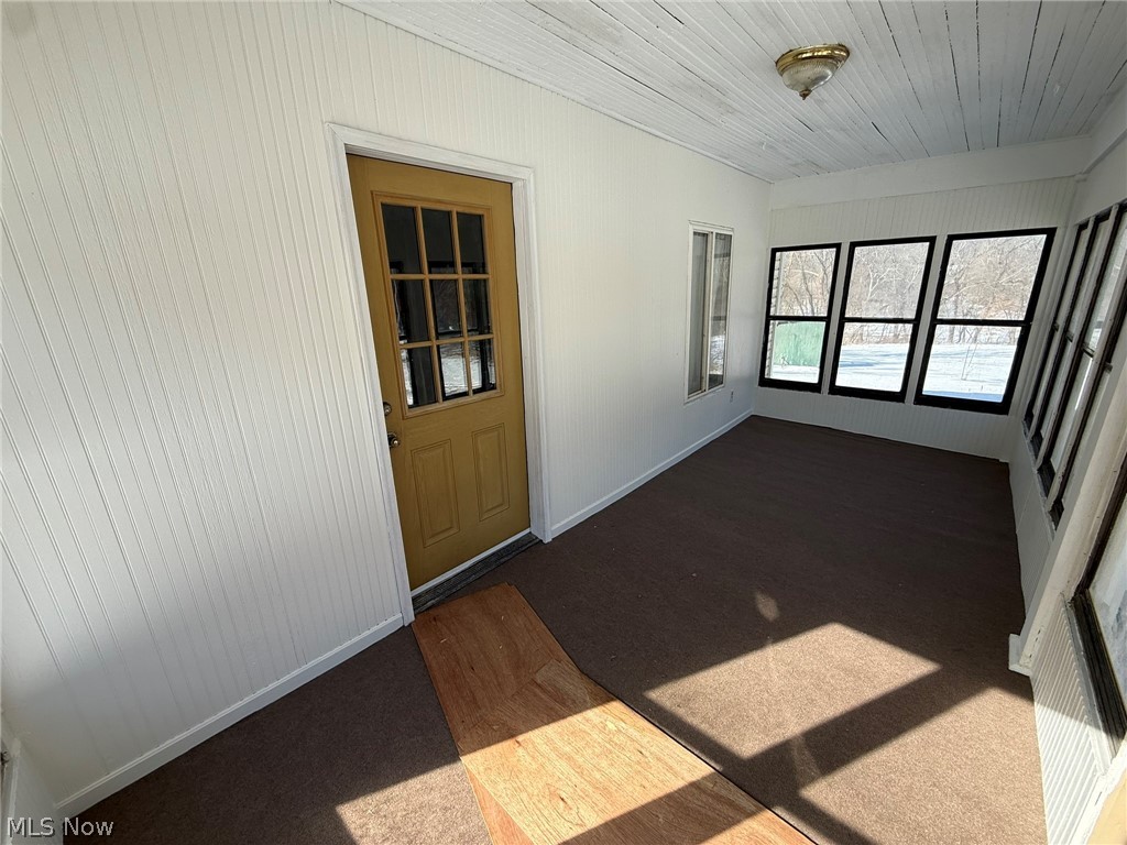 6784 Old Zoarville Road Northeast Dover, OH 44622 - Photo 8 of 50 View of unfurnished sunroom