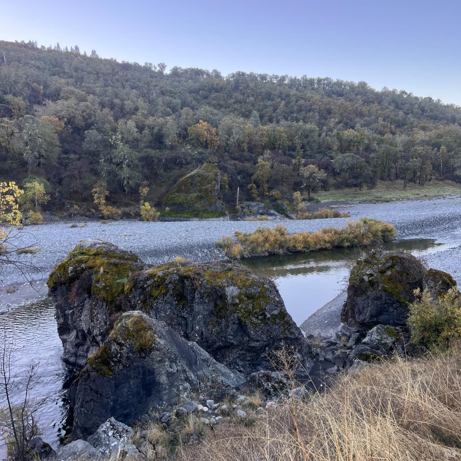 a view of a lake with a mountain