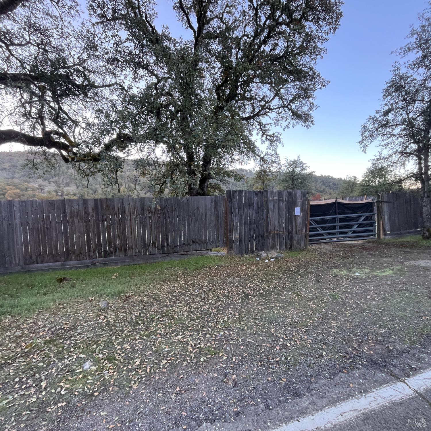 31975 Mendocino Pass Road Covelo, CA 95428 - Photo 22 of 23 a backyard of a house