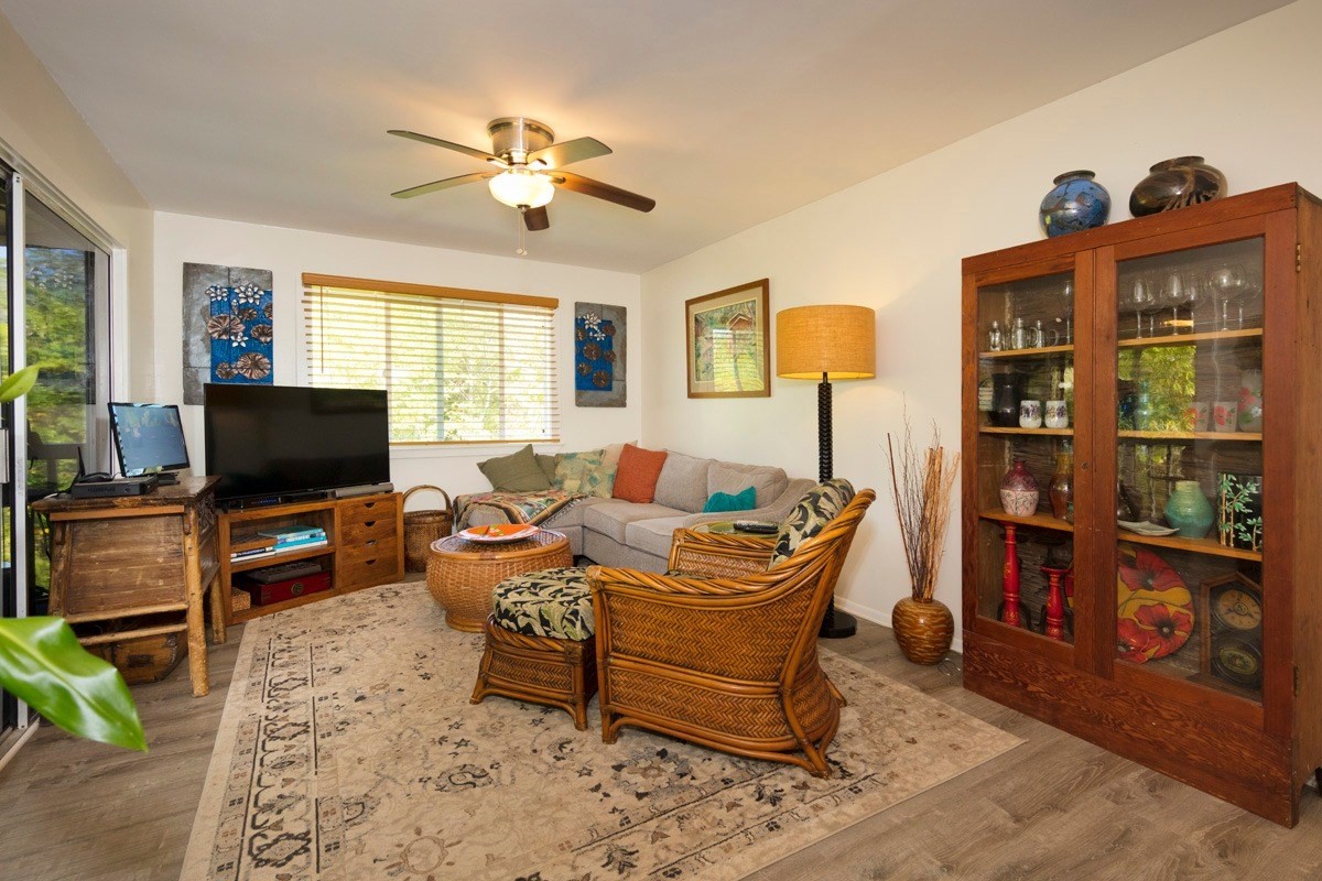 15-1565 Beach Road Keaau, HI 96749 - Photo 16 of 27 a living room with furniture and a flat screen tv