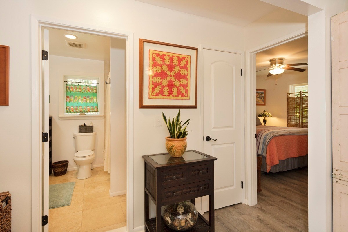 15-1565 Beach Road Keaau, HI 96749 - Photo 20 of 27 a view of a hallway with a livingroom and a dinning room