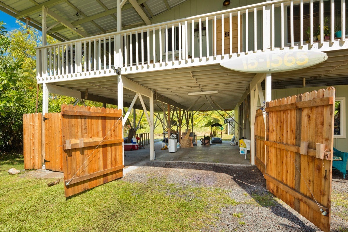 15-1565 Beach Road Keaau, HI 96749 - Photo 7 of 27 a view of a chairs with table in the patio