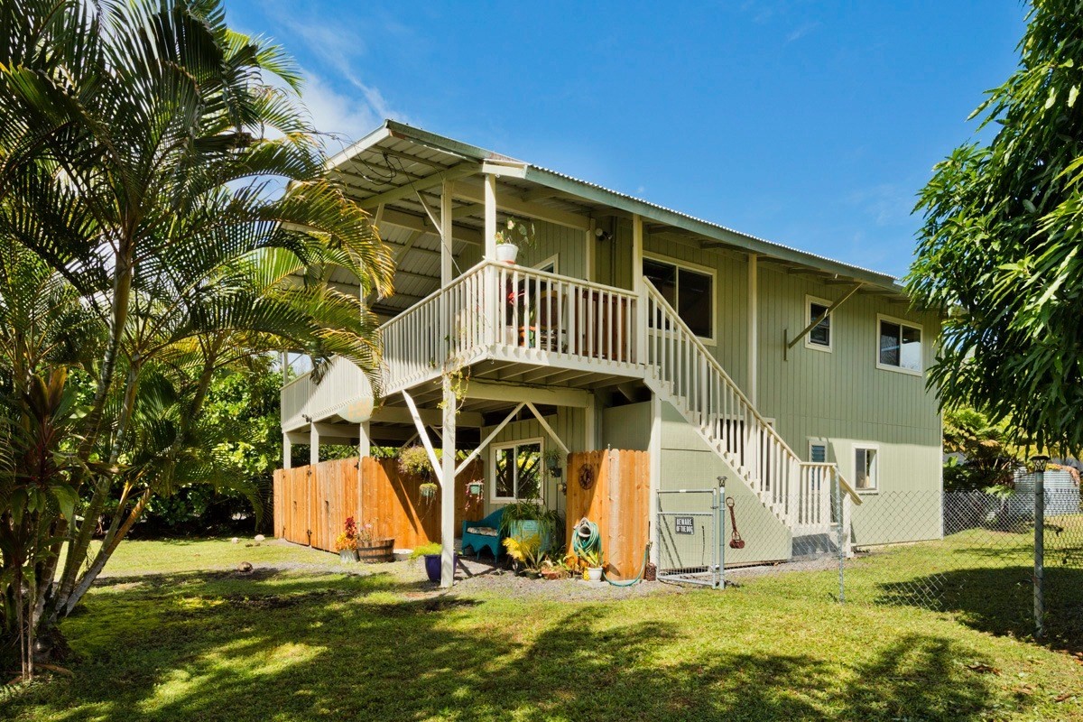 15-1565 Beach Road Keaau, HI 96749 - Photo 8 of 27 a view of a house with yard and trees