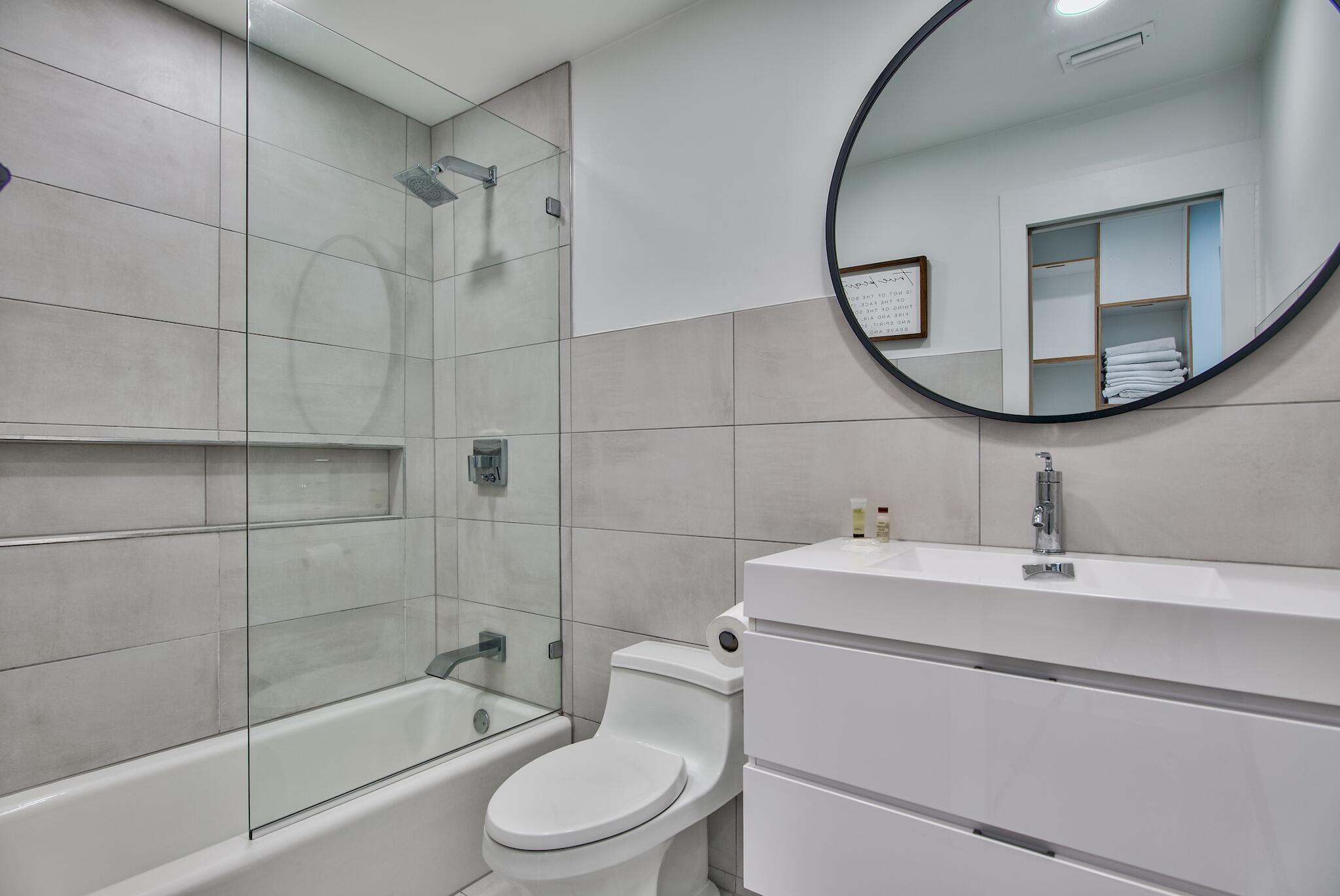 3692 East County Highway 30A, Unit 22 Santa Rosa Beach, FL 32459 - Photo 13 of 36 a bathroom with a sink toilet and shower