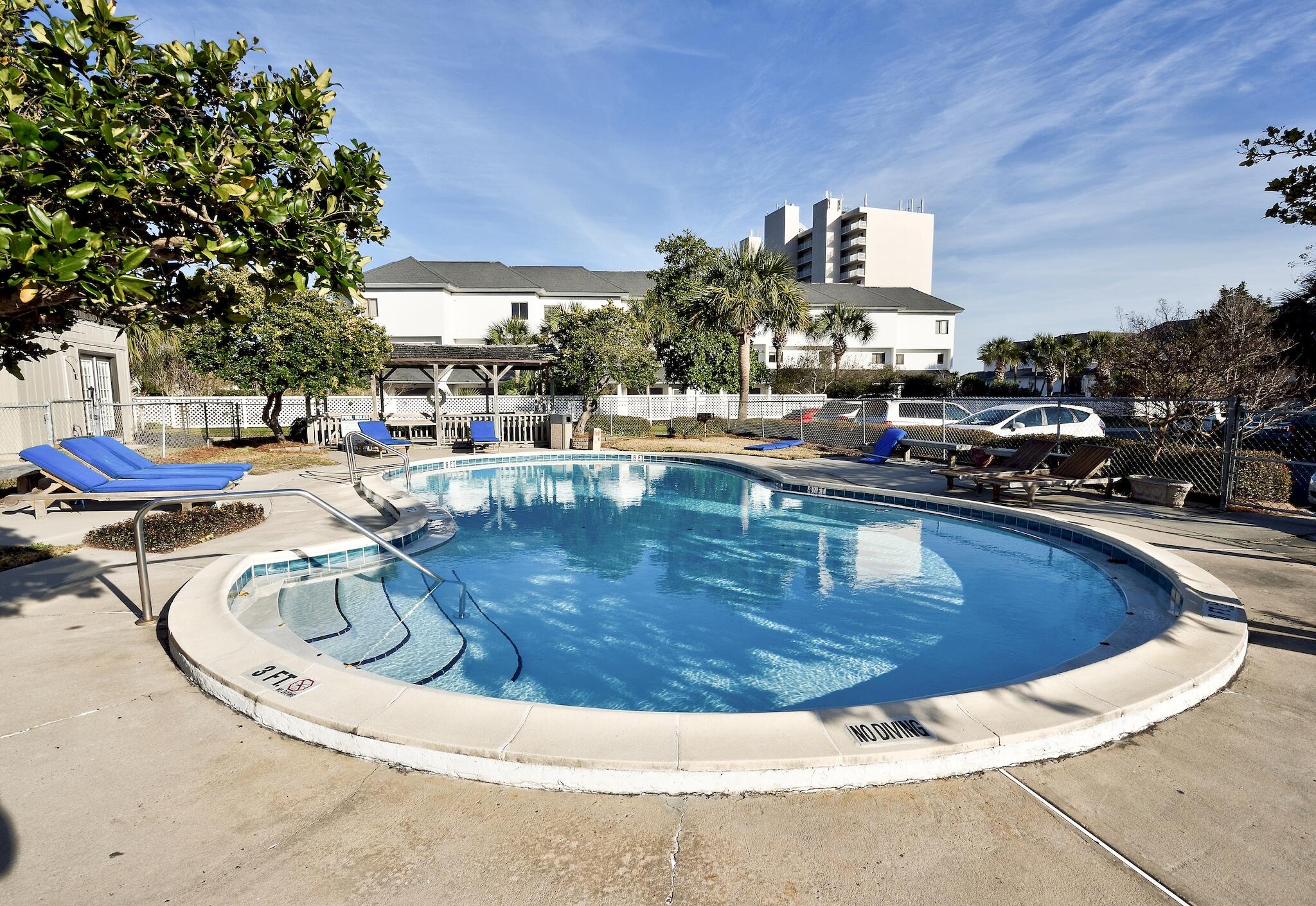 3692 East County Highway 30A, Unit 22 Santa Rosa Beach, FL 32459 - Photo 21 of 36 a view of a swimming pool with outdoor seating