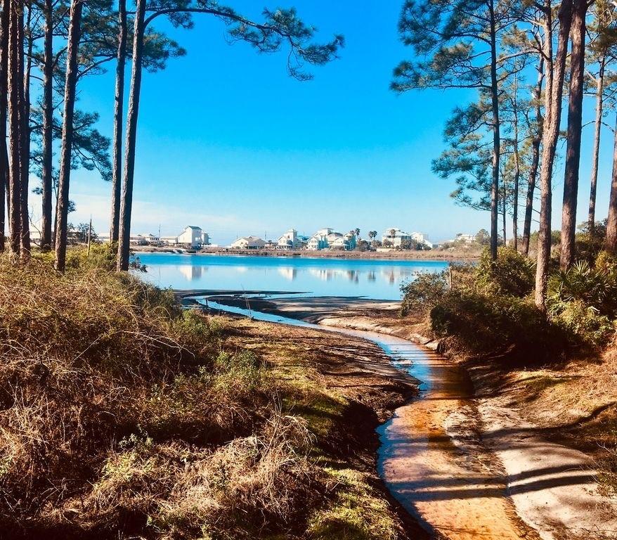 3692 East County Highway 30A, Unit 22 Santa Rosa Beach, FL 32459 - Photo 33 of 36 a view of a lake with a city