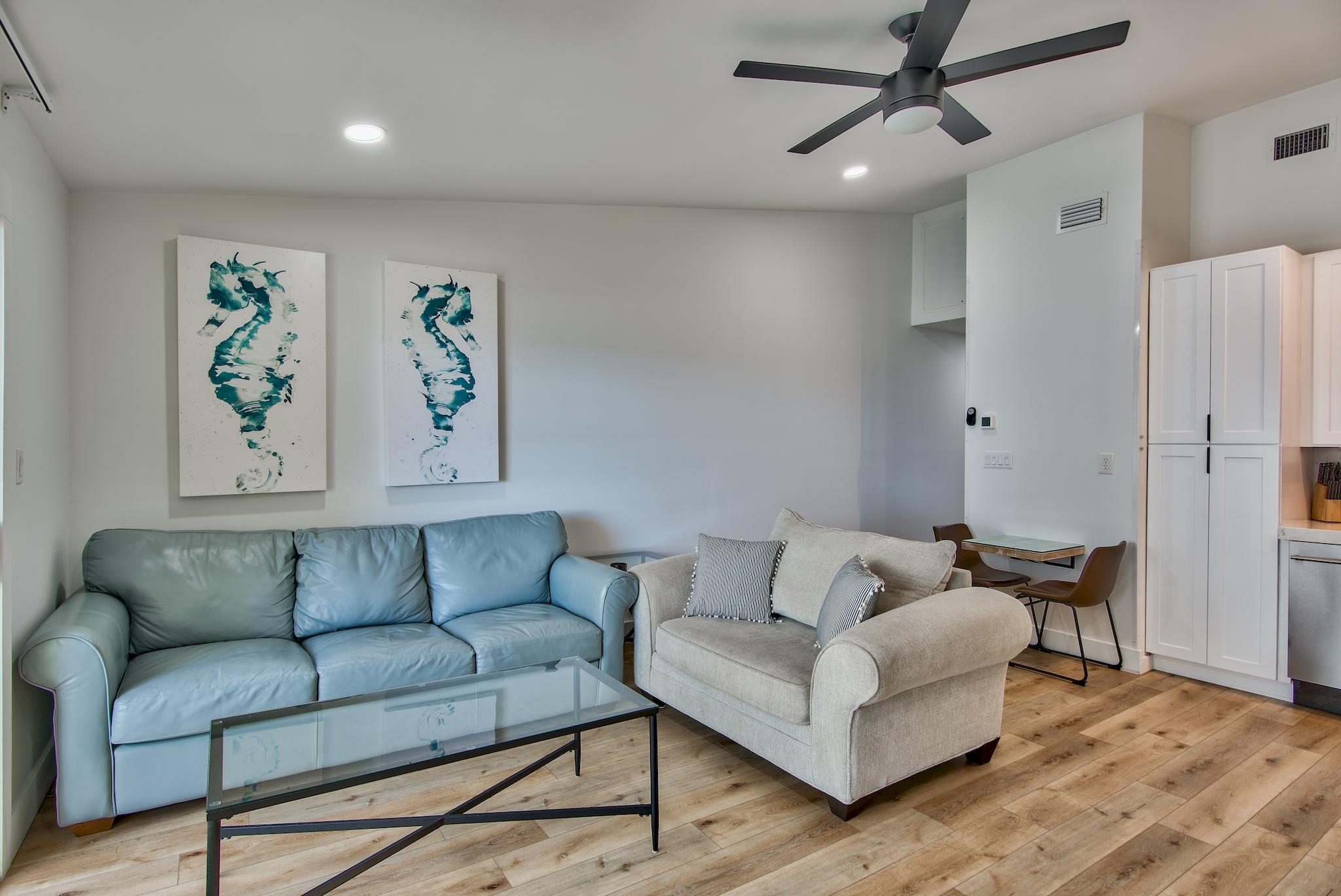 3692 East County Highway 30A, Unit 22 Santa Rosa Beach, FL 32459 - Photo 6 of 36 a living room with furniture and a wooden floor