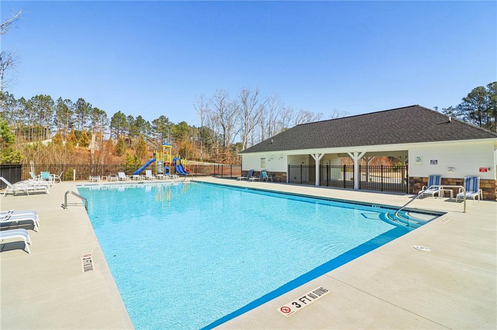 113 Deer Run Drive Dallas, GA 30132 - Photo 24 of 25 a view of a house with pool and a yard