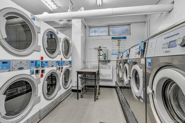 a view of a hallway with wooden shelves