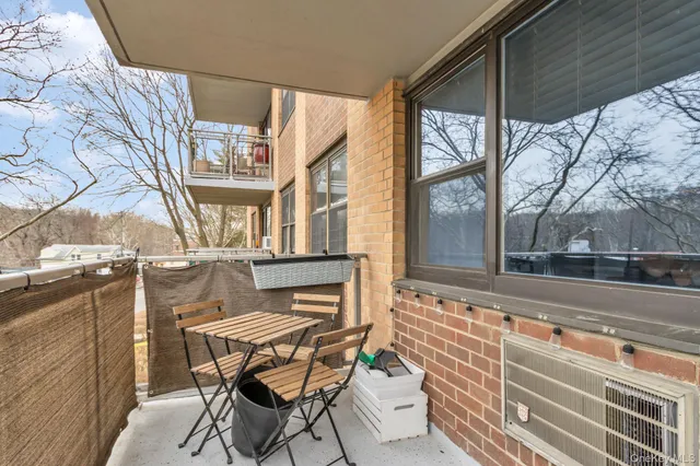 a view of road with a parked cars