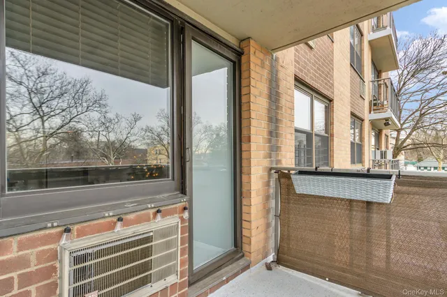 a view of a door and a window