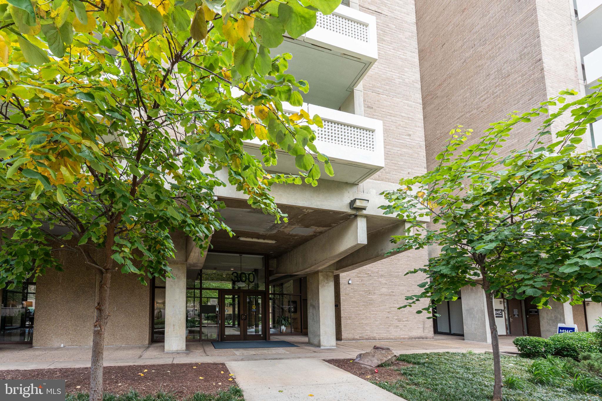 300 M Street Southwest, Unit N213 Washington, DC 20024 - Photo 4 of 14 front view of a house with a tree