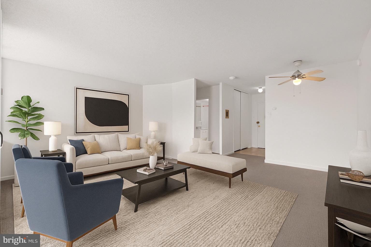 300 M Street Southwest, Unit N213 Washington, DC 20024 - Photo 9 of 14 a living room with furniture and a flat screen tv