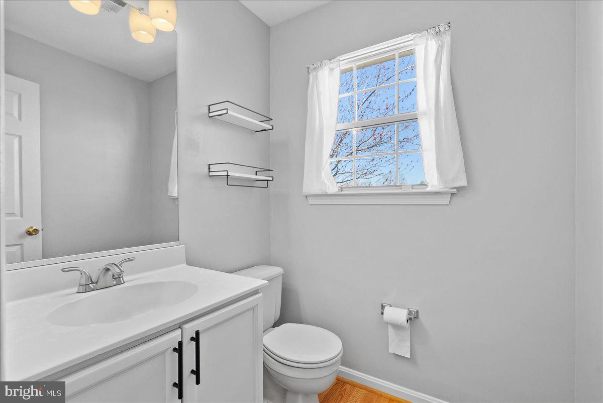 7930 Minor Hill Road Manassas, VA 20109 - Photo 12 of 26 a bathroom with a sink toilet and a mirror