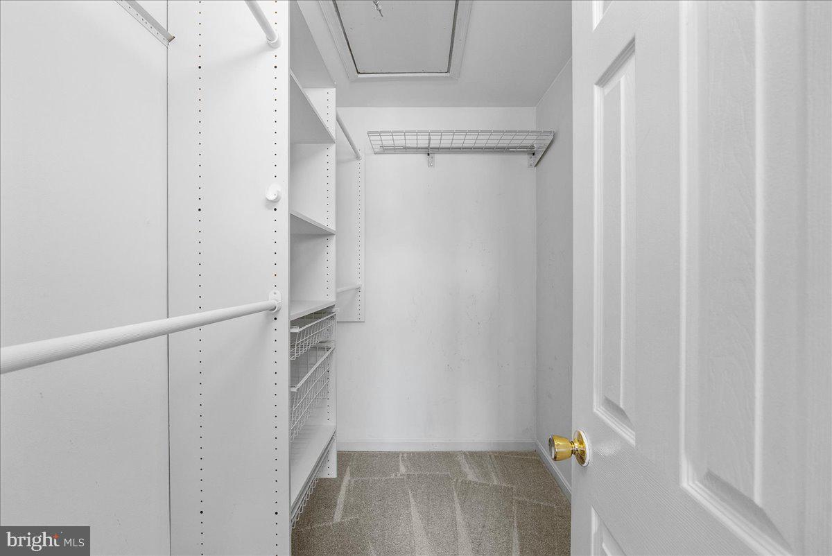 7930 Minor Hill Road Manassas, VA 20109 - Photo 17 of 26 a view of walk in closet with empty racks